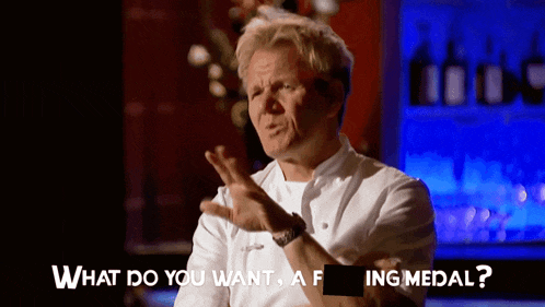 a man in a chef 's uniform is asking what do you want a f ing medal