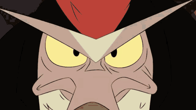a close up of a cartoon character 's face with yellow eyes and a red hat