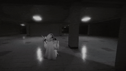 a black and white photo of a person standing in a dark room in a video game .