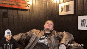 a gif from gifrun.com shows a man in a leather jacket