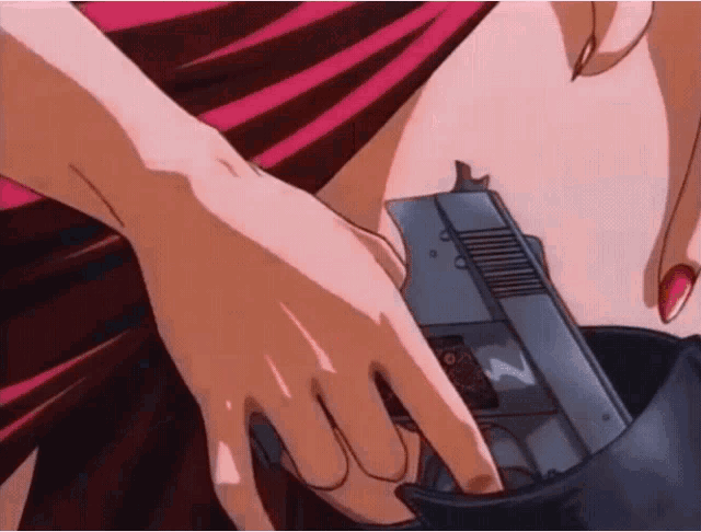 a woman with red nails is holding a gun with the letter z on it