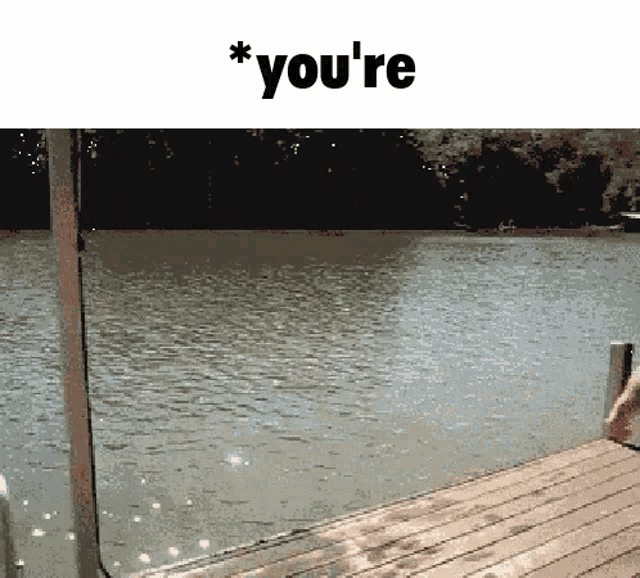a picture of a person jumping into a lake with the words " you 're " below it