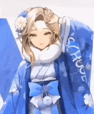 a girl in a blue and white kimono is standing in front of a white background .