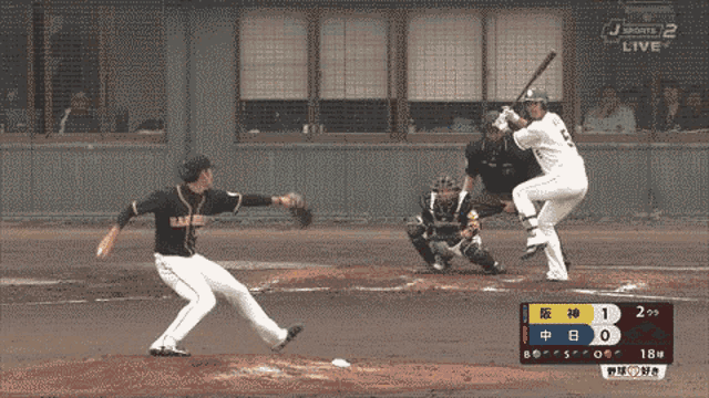 a baseball game is being played on j sports 2