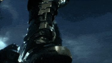 a close up of a metal object with a screw in it