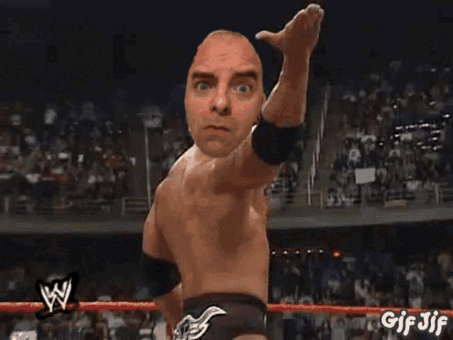 a gif of a man in a wrestling ring with the words gif jif on the bottom right