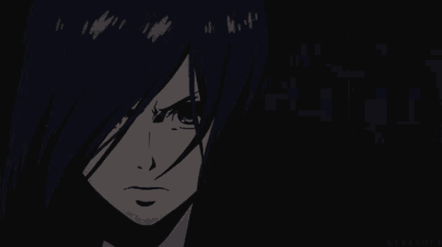 a close up of a person 's face with a dark background and a few lines on it