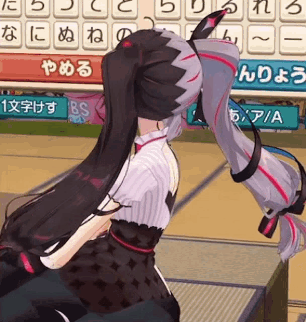 a girl with long hair is standing in front of a keyboard with japanese characters on it .