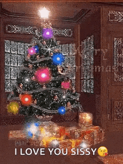 a christmas tree in a living room with the words i love you sissy written on the bottom