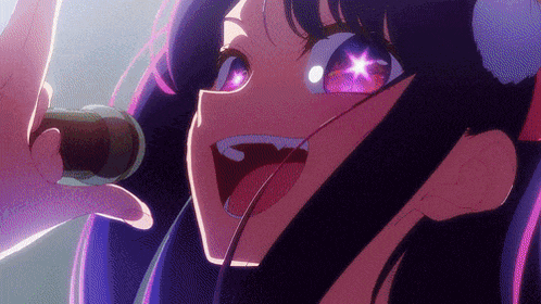 a close up of a girl with purple eyes singing into a microphone