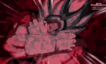 a close up of a cartoon character with a red background and a fist in the air .