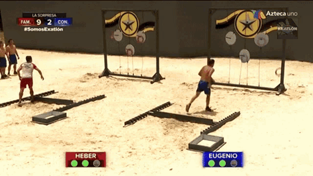 a soccer game between heber and eugenio is being played