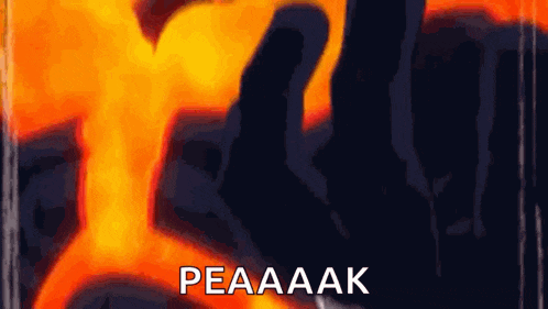 a person is standing in front of a fire with the words peaaak in white letters .