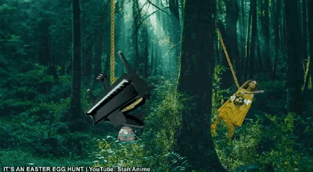 a piano is hanging from a rope in the woods with the words it 's an easter egg hunt