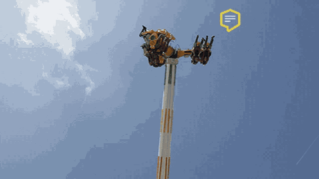 a roller coaster with a yellow speech bubble that says ' e ' on it