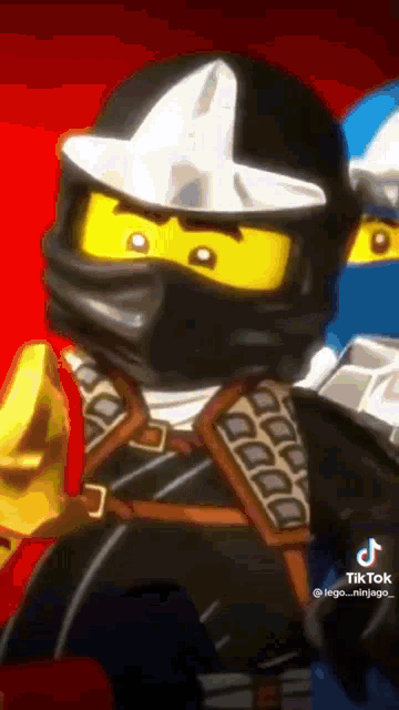 a lego ninjago character wearing a helmet and holding a sword .