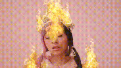 a woman with flames coming out of her head is wearing a flower crown .