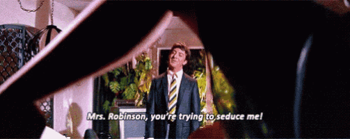 a man in a suit and tie says mrs. robinson you 're trying to seduce me !