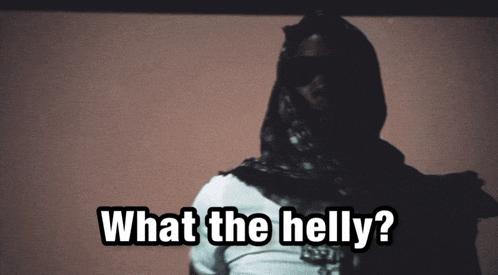 a person with a scarf around their head and the words what the helly