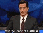 a man in a suit and tie is giving a speech and says `` youre welcome for nothing '' .