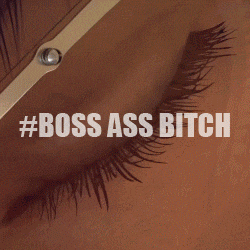 a close up of a person 's face with the words #boss ass bitch