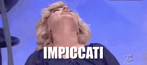 a woman is looking up at the sky with the words implicitati above her head .