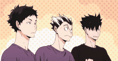 a group of three anime characters are standing next to each other and making different faces .