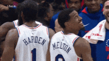 basketball players harden and melton are standing next to each other on the court