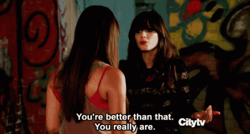 two women are standing next to each other and one of them is saying you 're better than that .