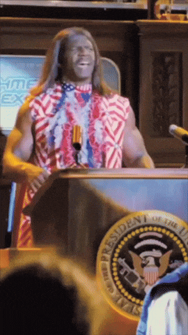 a man stands at a podium with a presidential seal in front of him