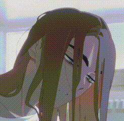 a close up of a person 's head with their hair covering it .