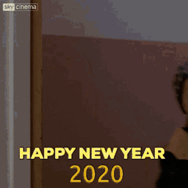 a picture of a boy with the words happy new year 2020 written on it