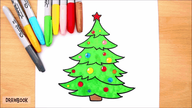 a drawing of a christmas tree surrounded by markers with drawbook written below it