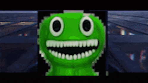 a green frog with white teeth and big eyes is smiling .