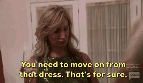 a woman in a green dress is saying `` you need to move on from that dress . that 's for sure . ``