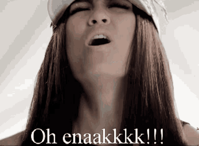 a woman with her mouth open and the words oh enaakkkk