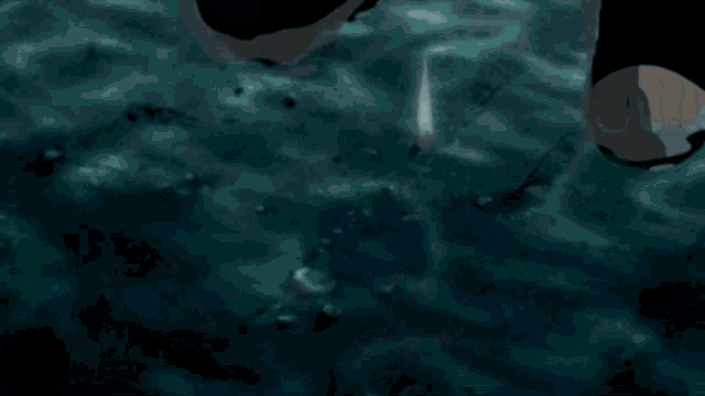 a person 's feet are surrounded by a circle of ice