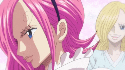 a girl with pink hair has a blue eye