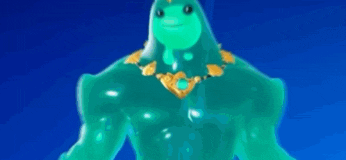 a blurry picture of a green monster with a crown on his head