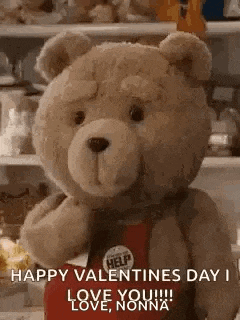 a teddy bear is holding a heart and saying `` happy valentines day i love you !!! love , nonna . ''