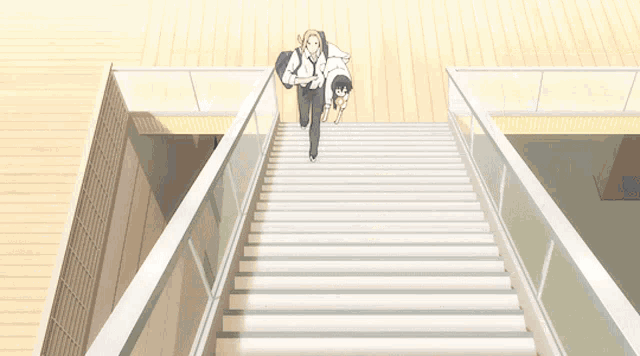 a man and a boy are running up a set of stairs
