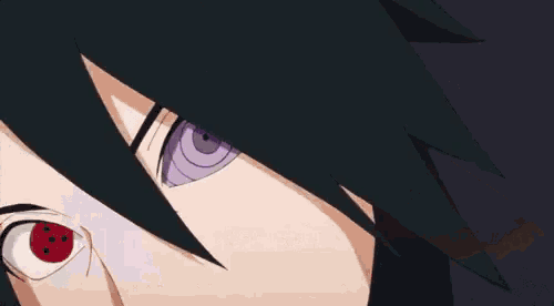 a close up of a person 's eye with a purple eye