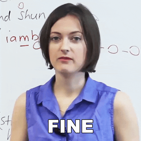 a woman wearing a blue shirt says fine