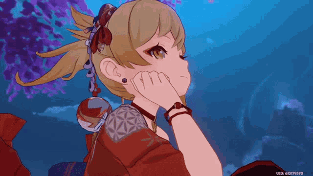 a close up of a girl 's face with a blue sky in the background .