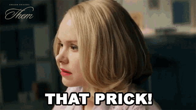 a woman says that prick in front of her