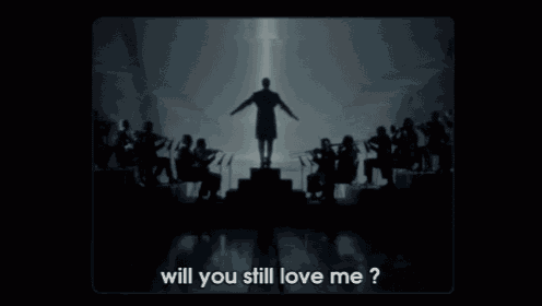 a man stands on a pedestal in front of an orchestra with the words " will you still love me " below him