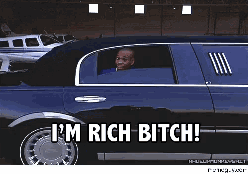 a man in a limousine with the words i 'm rich bitch on it