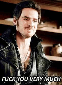 a man in a leather jacket says " fuck you very much " while smiling