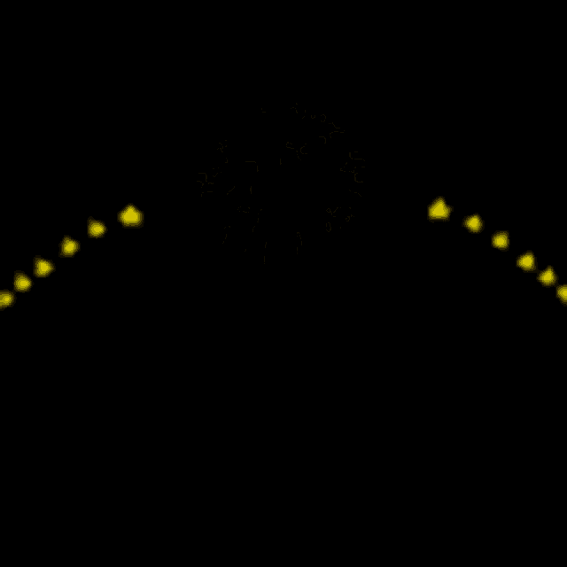 a yellow firework display is exploding in the dark