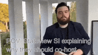 a man with a beard is explaining why they should co-host a video .